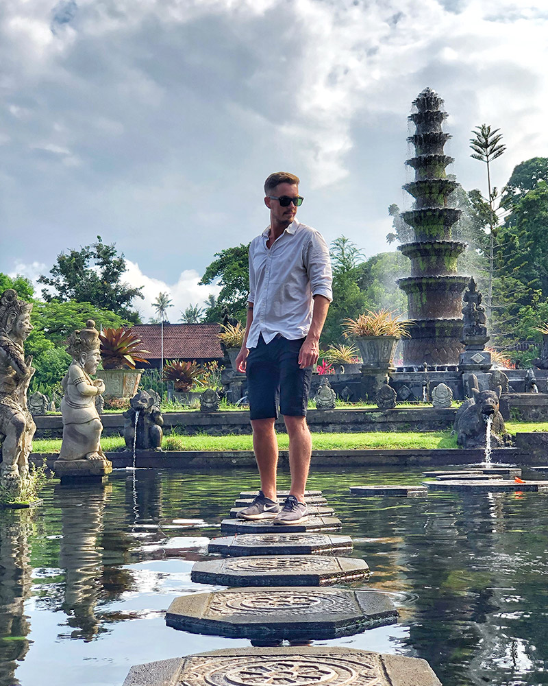 Wedding videographer exploring historic temple during travels
