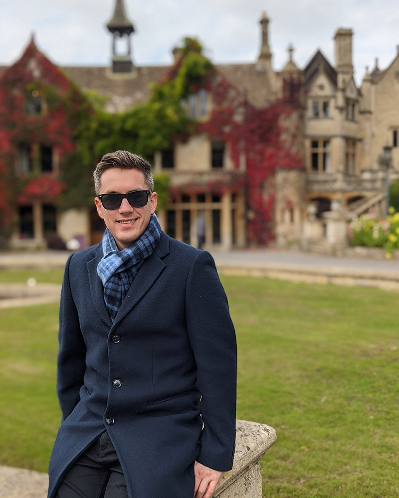 Wedding videographer posing at historic venue location