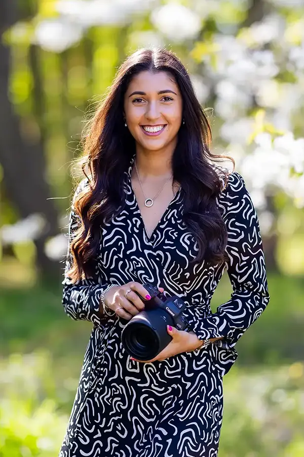 luxury-wedding-photographer-standing-in-a-forrest